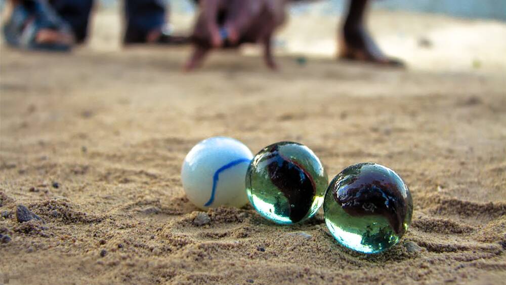 Tileh Bazi (Marble ball) 